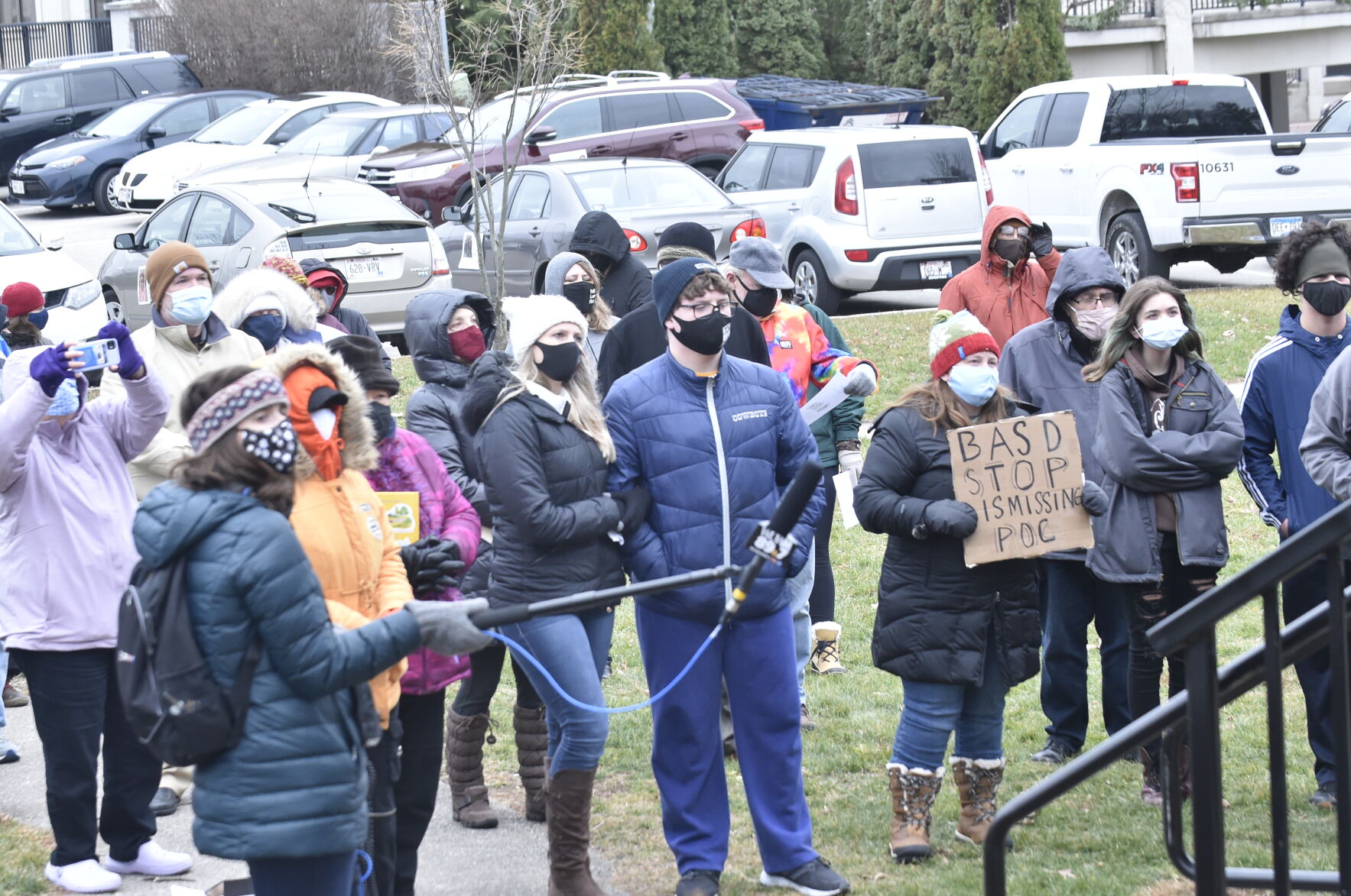 Crowd of dozens gathers at Echo Veterans Memorial Park in Burlington for Black Education Matters Demonstration